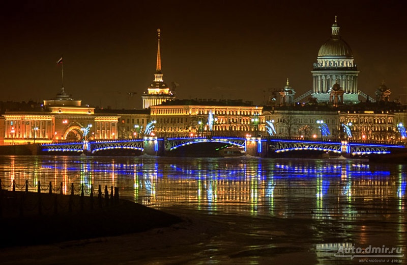 The Palace bridge in the waters of the Neva Majestic architectural ensembles